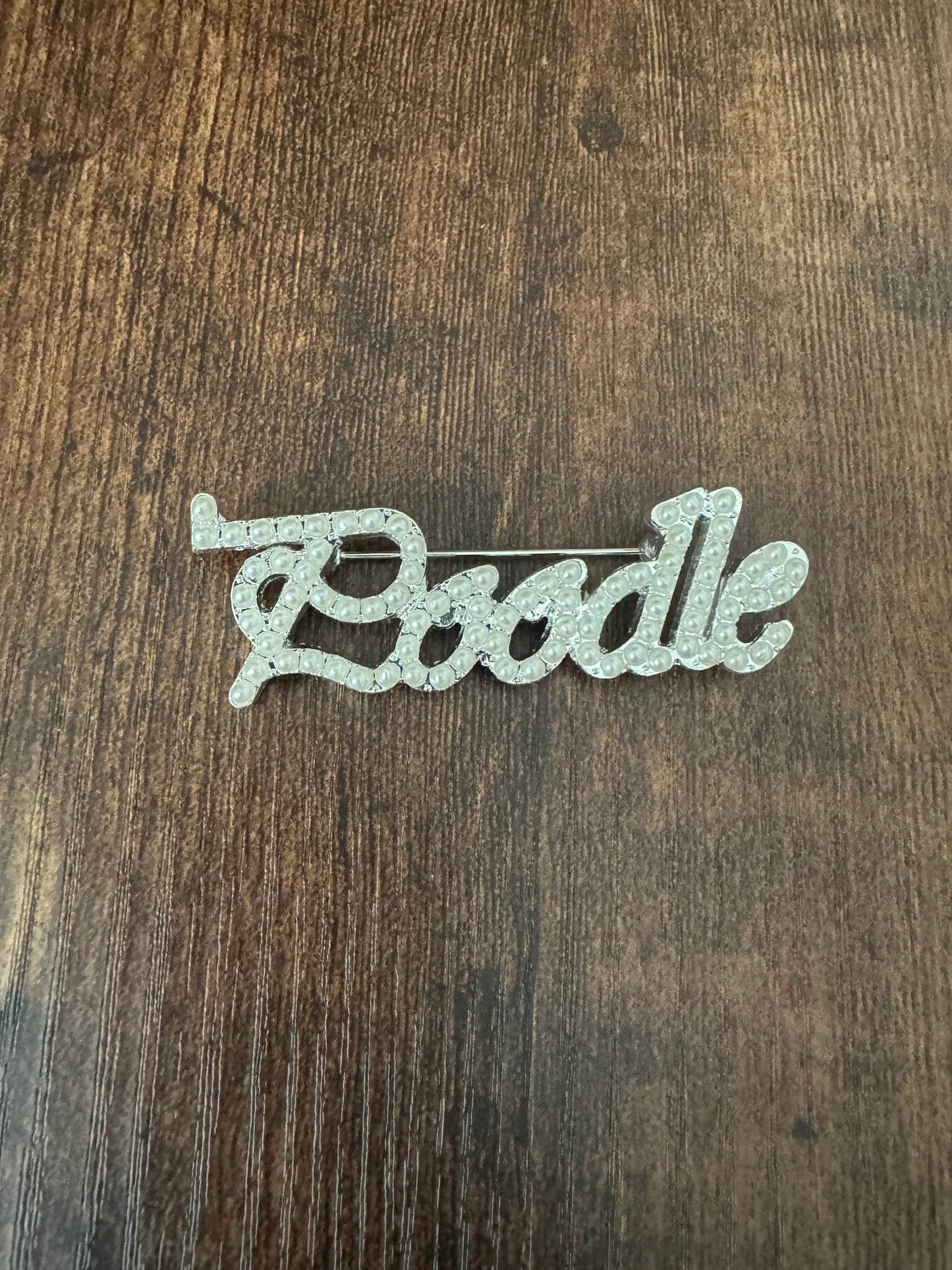 “Poodle” lapel pin